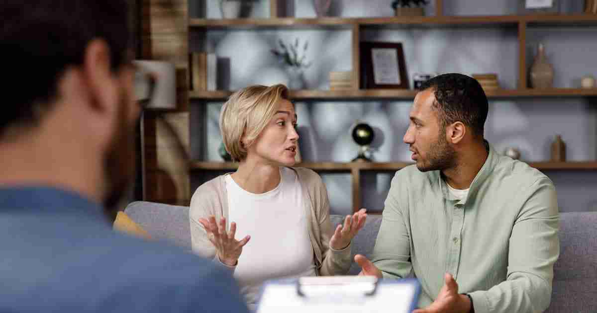 couple arguing during marriage counseling