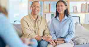 happy couple in marriage counseling