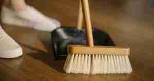 someone sweeping a floor