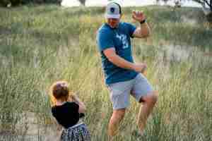 dad demonstrating to daughter