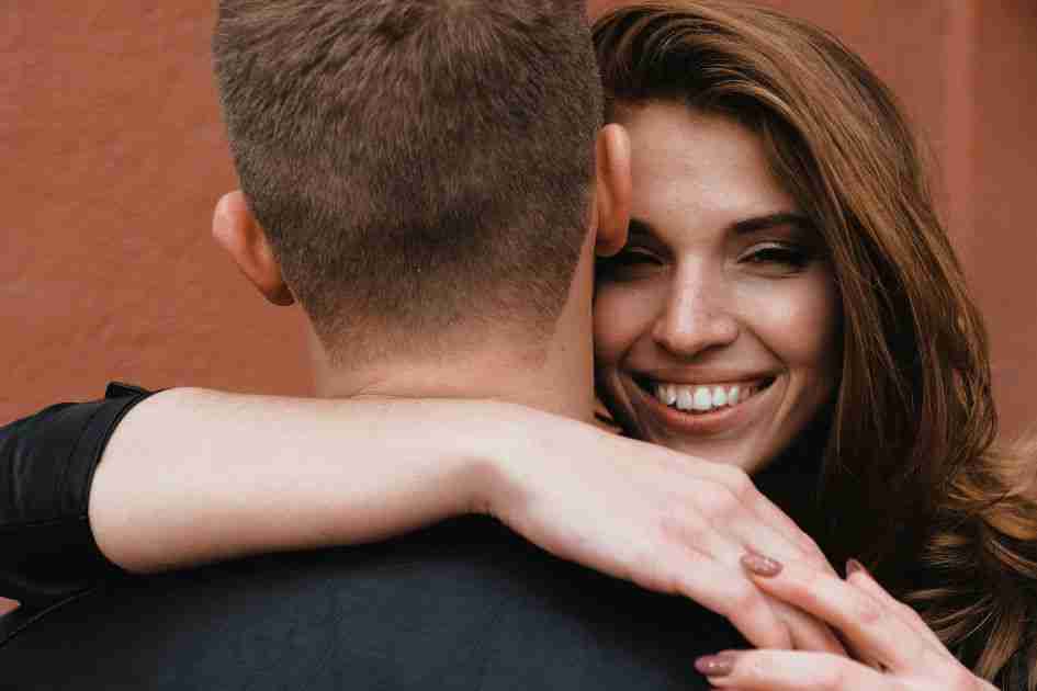 hugging marred couple