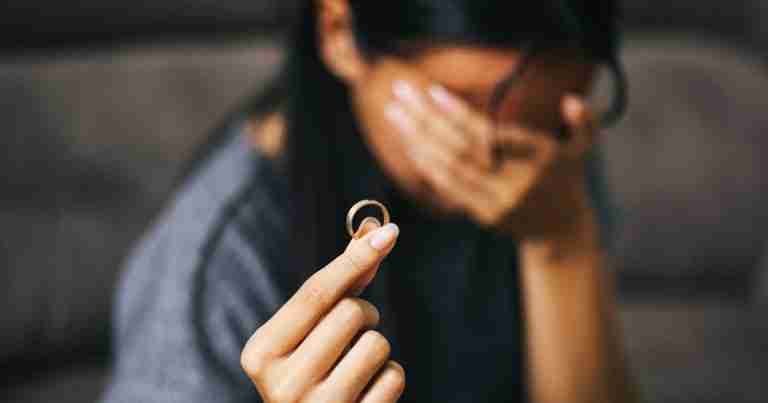 woman with removed wedding ring