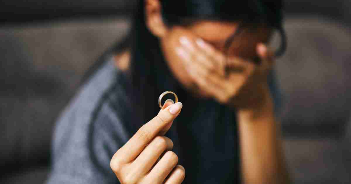 woman with removed wedding ring